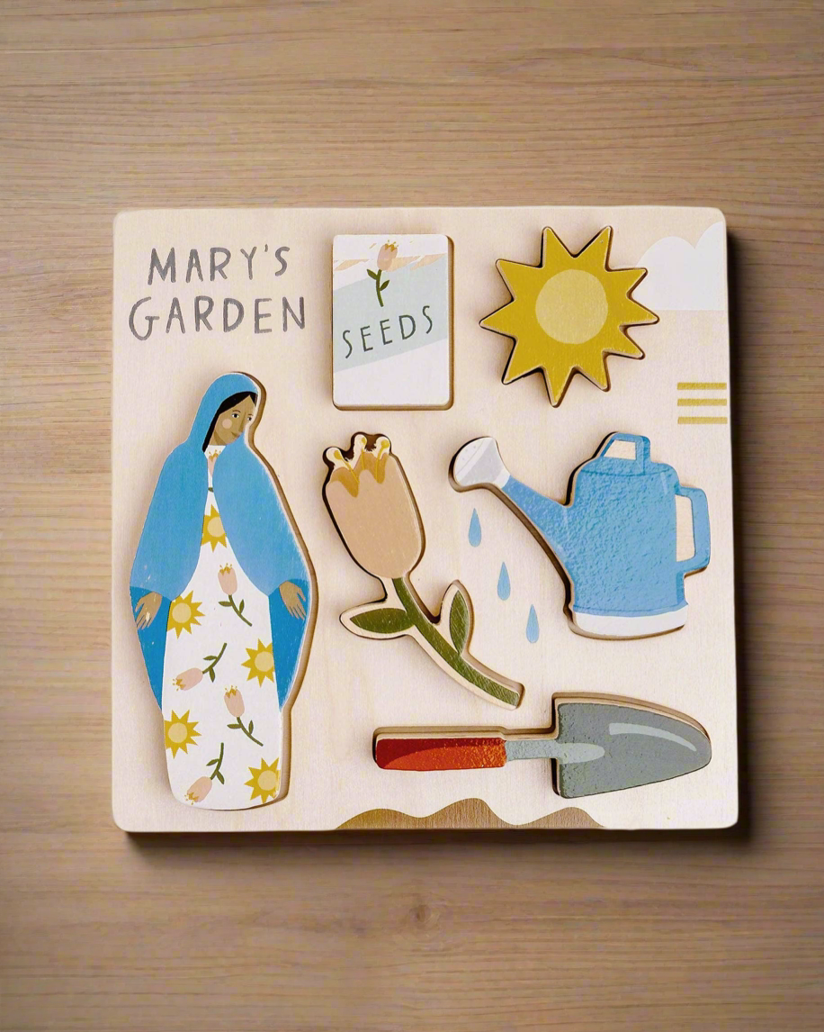 Mary’s Garden puzzle featuring Mary, Flowers, Shovel, Watering can, Seeds, and Sun.