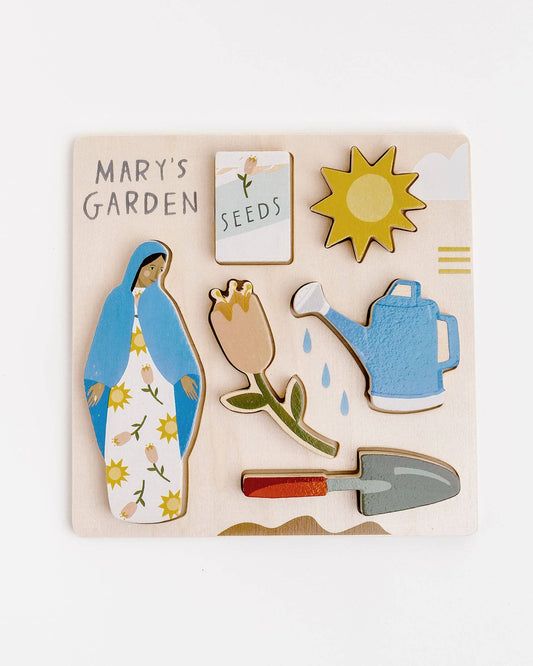 Mary’s Garden puzzle featuring Mary, Flowers, Shovel, Watering can, Seeds, and Sun.