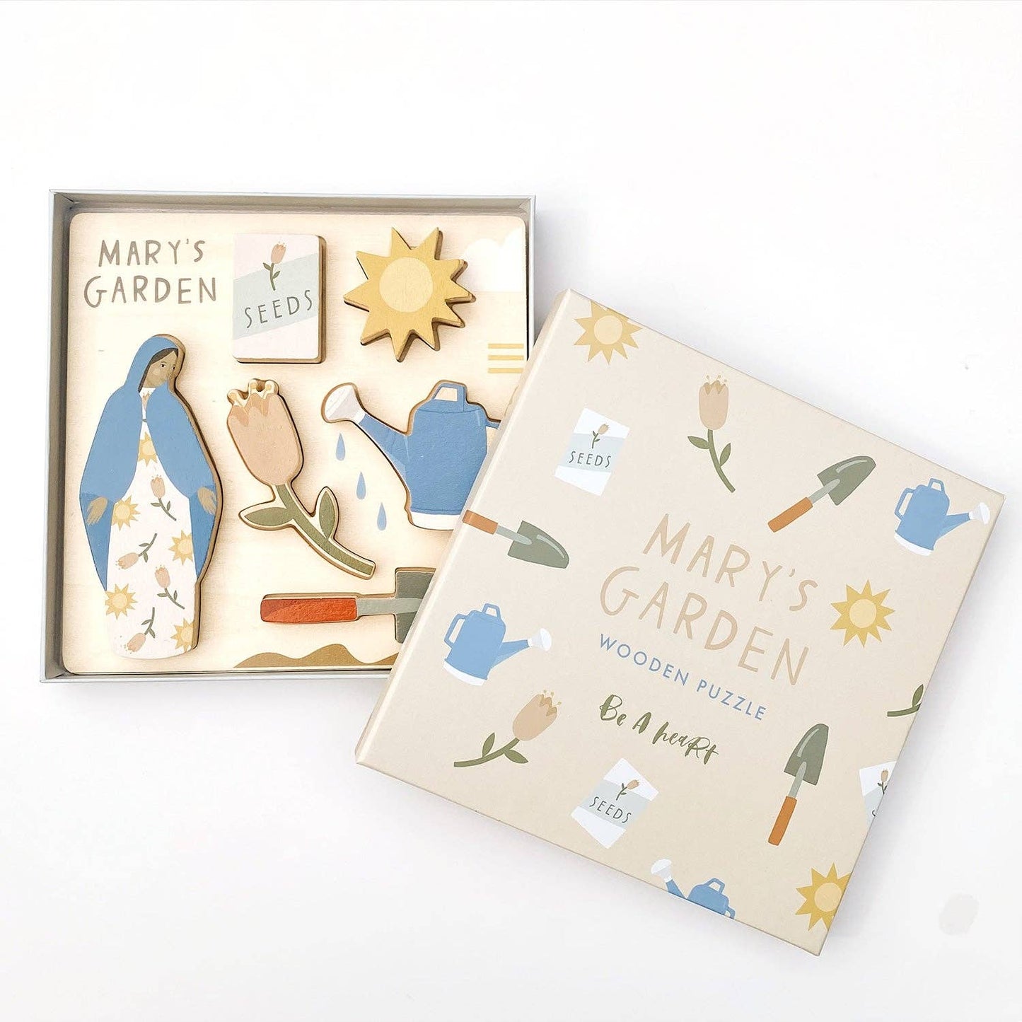 Mary’s Garden puzzle featuring Mary, Flowers, Shovel, Watering can, Seeds, and Sun in a box.