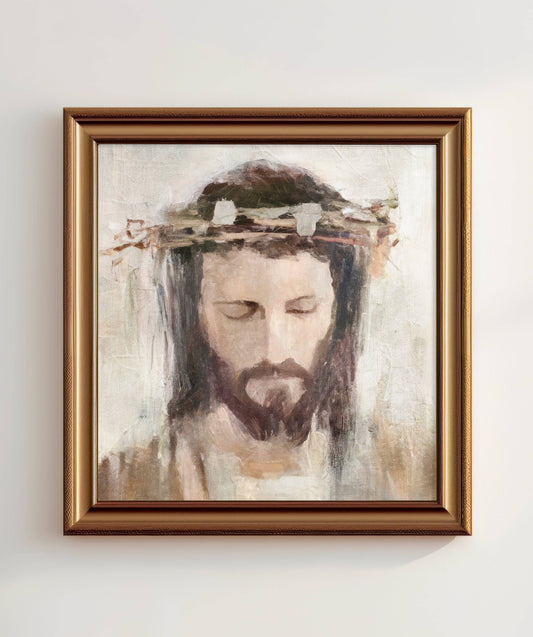 Artwork featuring a crowned Jesus in a gold frame.