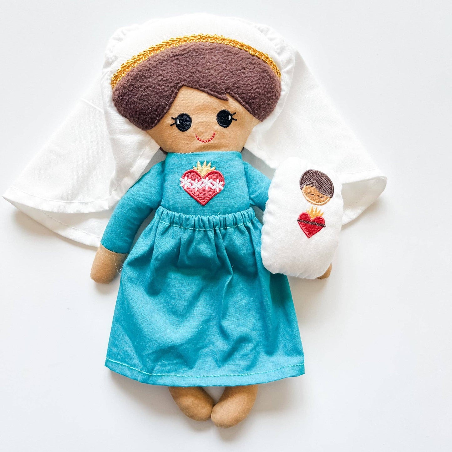 Sacred Heart of Mary doll holding baby Jesus doll