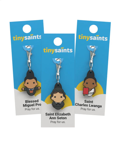 Tiny Saint Charm keychain featuring different saints