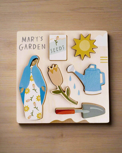 Mary’s Garden puzzle featuring Mary, Flowers, Shovel, Watering can, Seeds, and Sun. 